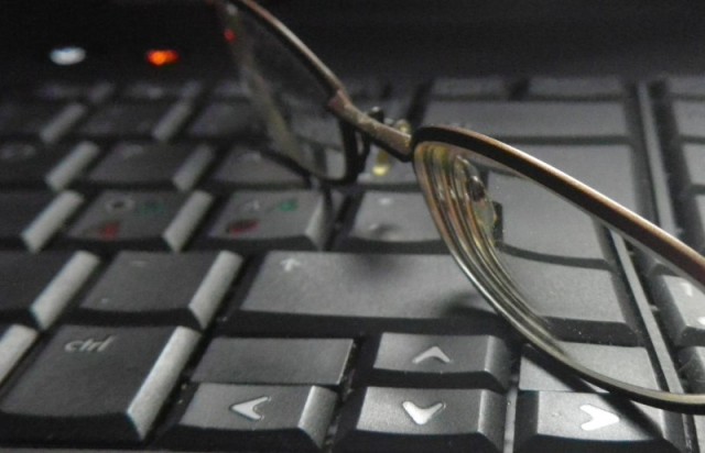 eyeglasses on computer keyboard