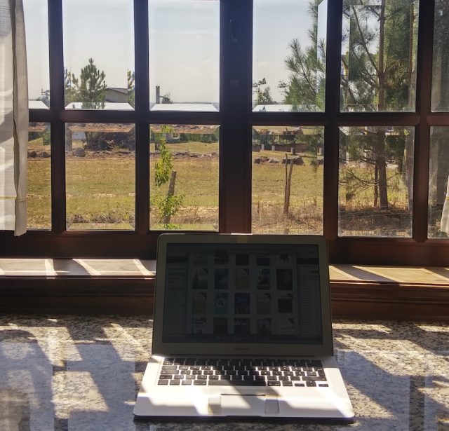 North Portugal, office of a digital nomad on kitchen table