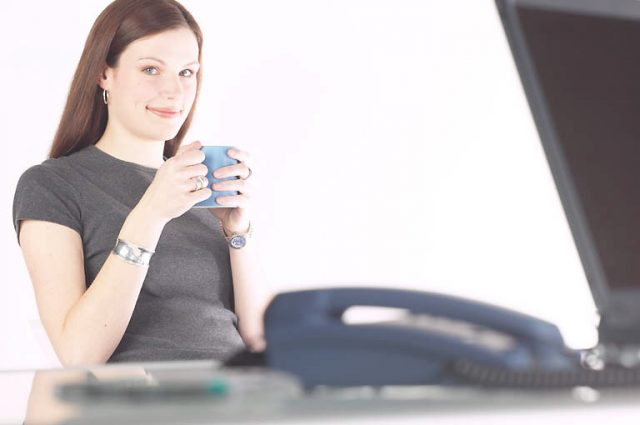 woman drinking coffee, thinking what to write