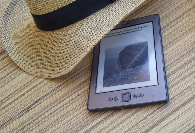 Amazon Kindle e-reader in sunshine
