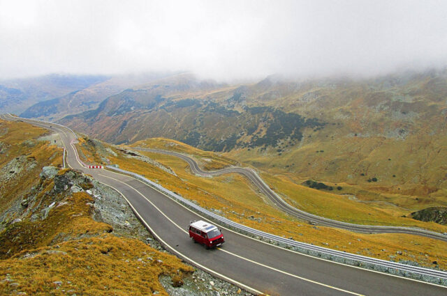 camper van mountain road romania by livin4wheel