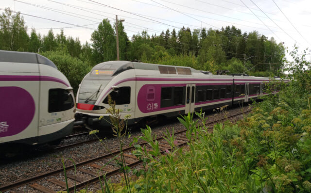 electric train speeding on rails