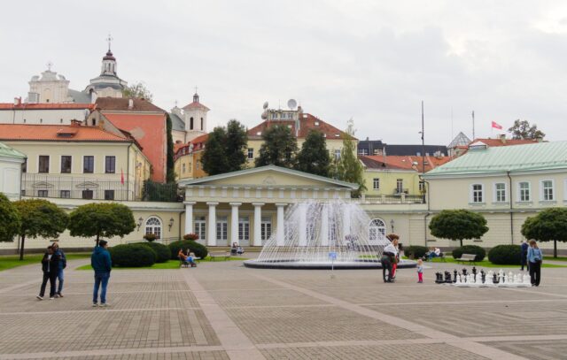 a square in vilnius with multiple architecture styles